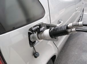 Hydrogen fuel car at fueling station