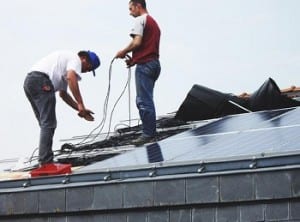 Solar Energy - Installation of solar panels on roof
