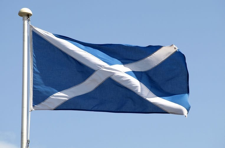 Scotland Wind Energy - Scottish flag blowing in wind