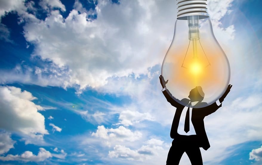 Renewable Energy Plan - Man holding lightbulb