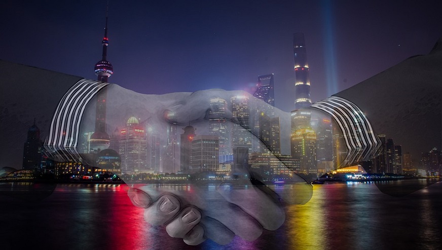 electric vehicles partnership - handshake - Shanghai, China