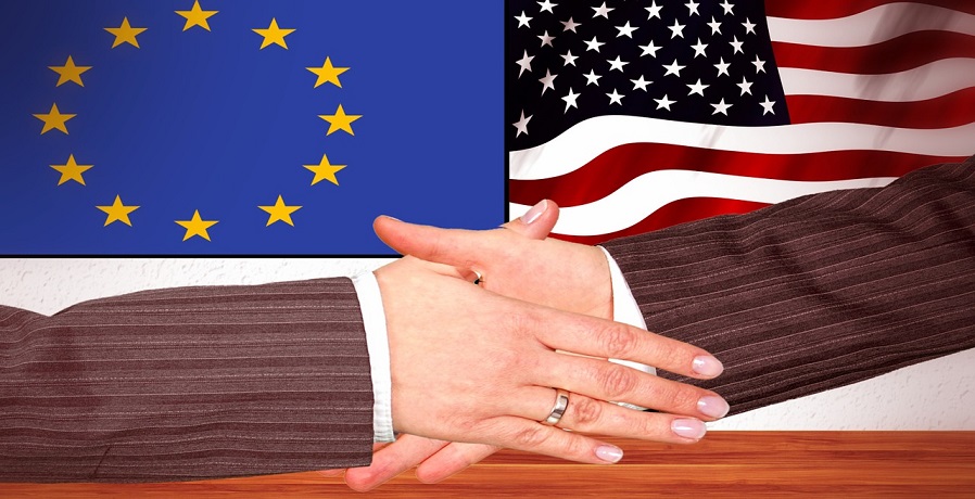 European Green Deal - Handshake - EU and American Flags