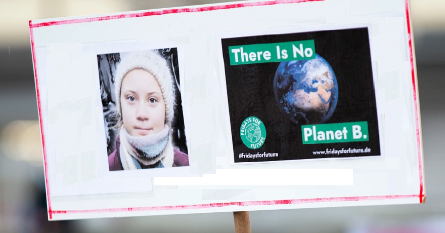 Climate change action - Greta Thunberg on climate activist sign