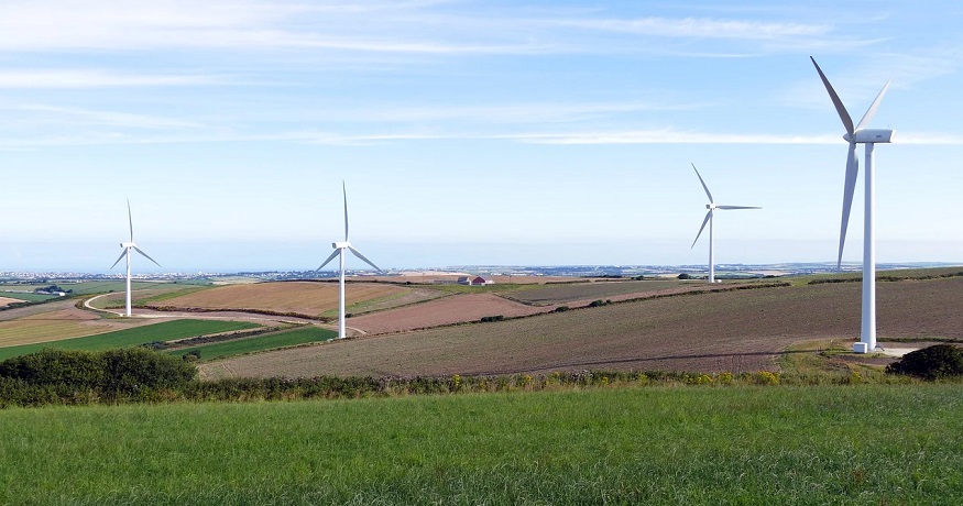 Wind turbine farms - wind turbines in field
