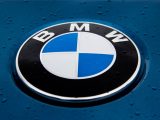 BMW hydrogen fuel - BMW logo on wet vehicle