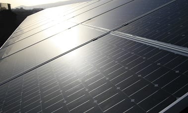 Solar Energy - Sun Shining on Solar Panels