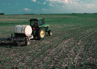 biogas waste converted into fertilizer - image of farm fertilizing