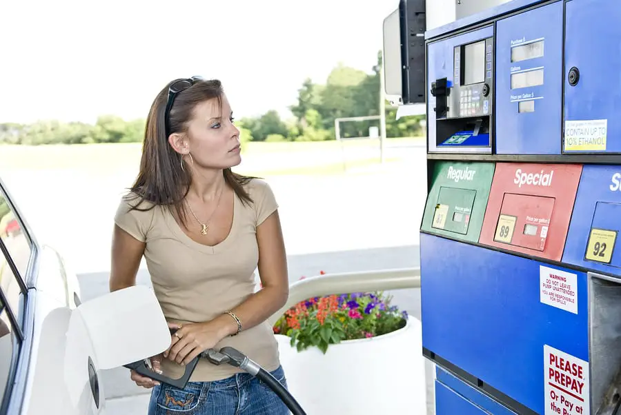 Hydrogen Fuel Station - Woman pumping gas