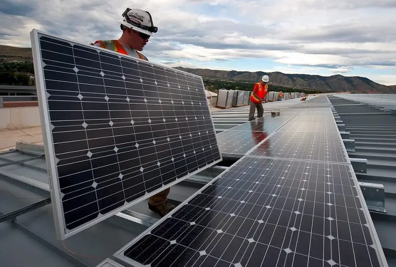 Solar Energy Industry - Solar panels being installed on rooftops