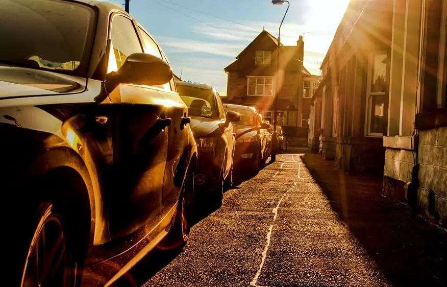 Solar electric car - Cars on raod in sunlight