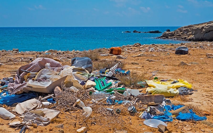 greenhouse gases - Plastic waste on beach