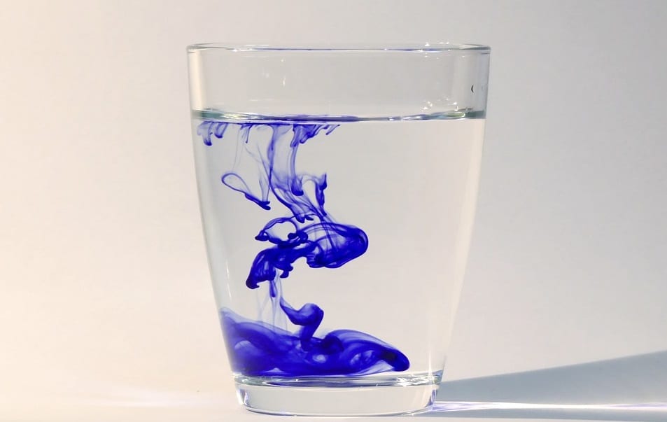 Renewable energy storage - Water in cup with blue dye