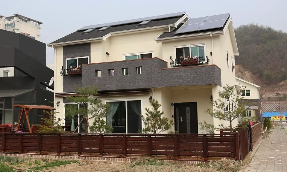 stored hydrogen and solar energy - home with solar panels on roof