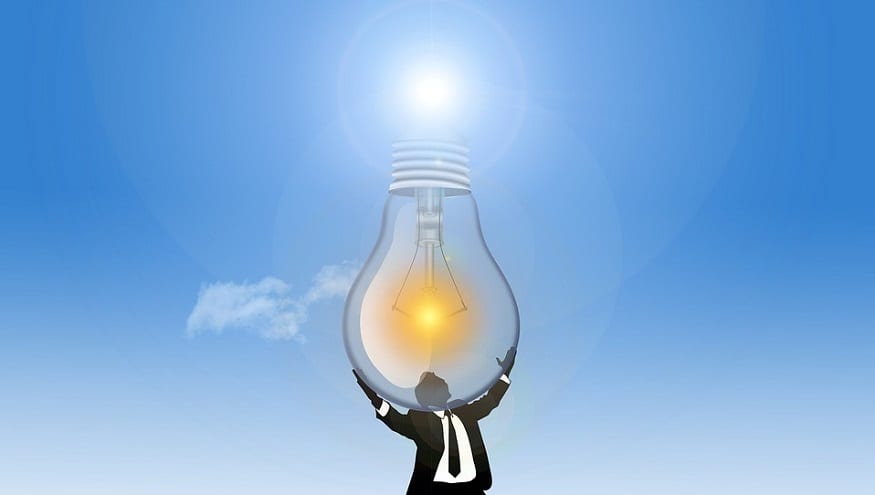 Hydrogen production - Man holding lightbulb up to sun