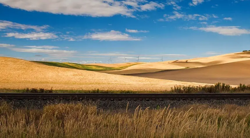 renewable power transmission line - Railroad and wind turbines