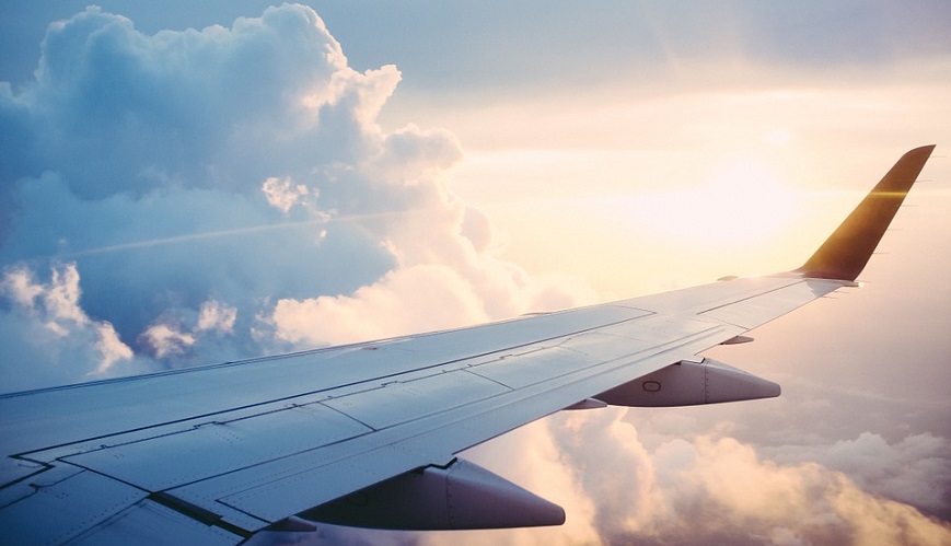 Cryogenic liquid hydrogen - Wing of aircraft, sky, sun