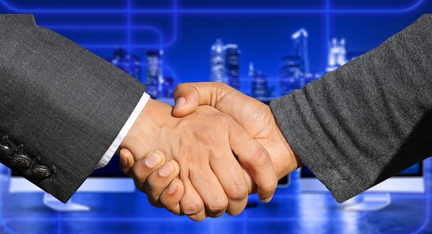 Hydrogen fuel cell technology - comapny acquisition - business handshake