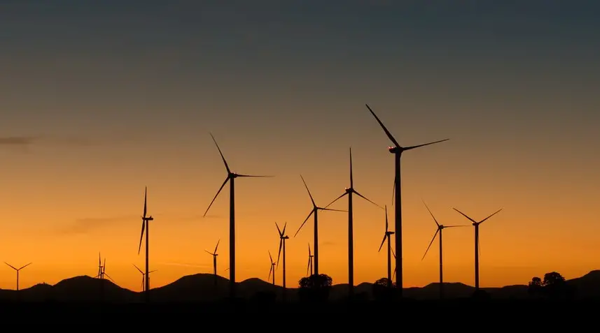 Kenya wind power - Wind turbine at sunset