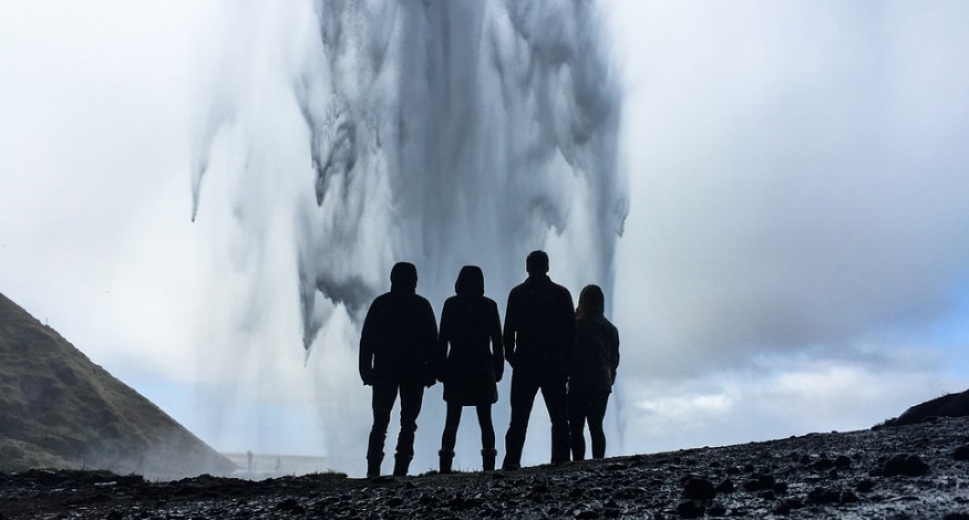Geothermal Energy Contract - Group of people standing in front of geyser