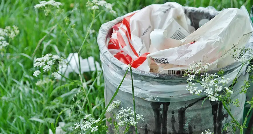 waste-to-energy market - trash can in field