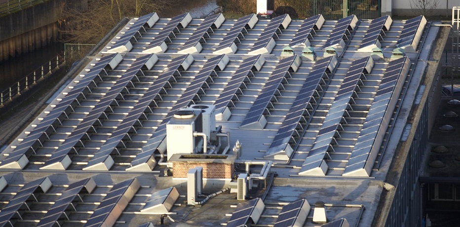 Solar powered factory - solar panels on roof of building