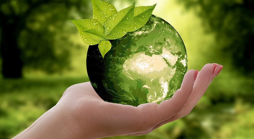 Global hydrogen demand - hand holding green earth