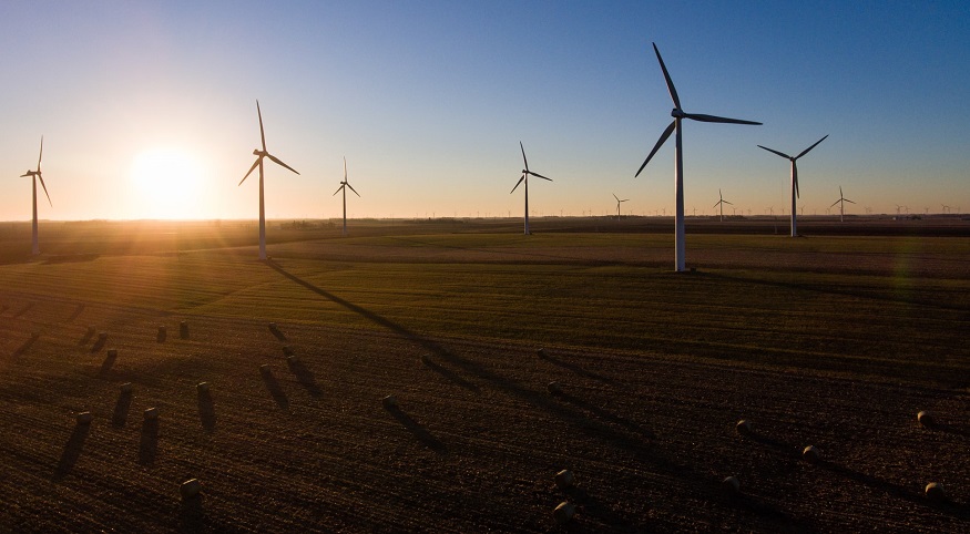 Clean energy solicitations - wind turbines at sunrise