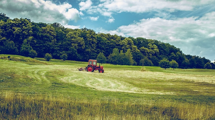 Climate change challenges - Tractor in Field