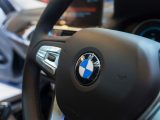 BMW iX5 Hydrogen - Image of a BMW steering wheel