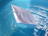 Green hydrogen - paper boat in water