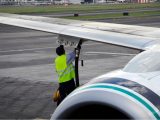 Liquid hydrogen - Person fueling up airplane