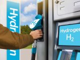 Hydrogen fuel stations - person using H2 to refuel