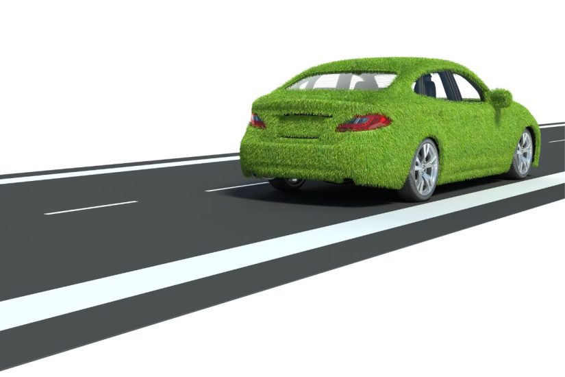 Hydrogen fuel vehicle - Green car on road