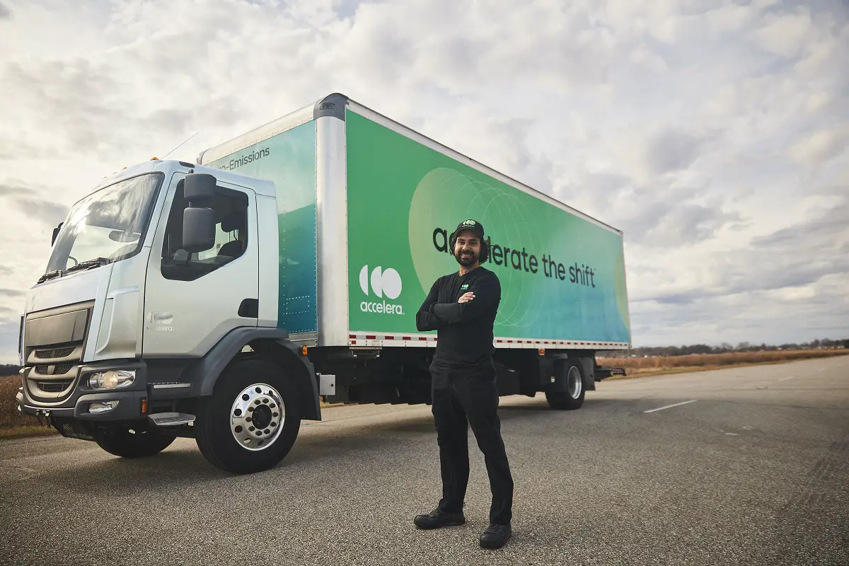 New Cummins brand - Male truck driver standing in front of an Accelera zero-emission-truck