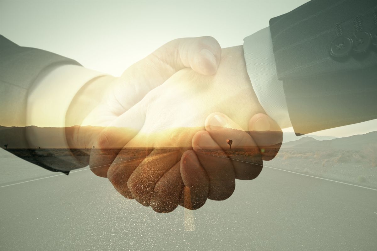 Hydrogen electric trucks - Partnership - handshake