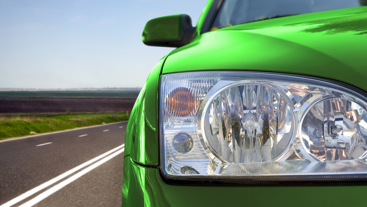 Hydrogen cars - Image of green colored car on road