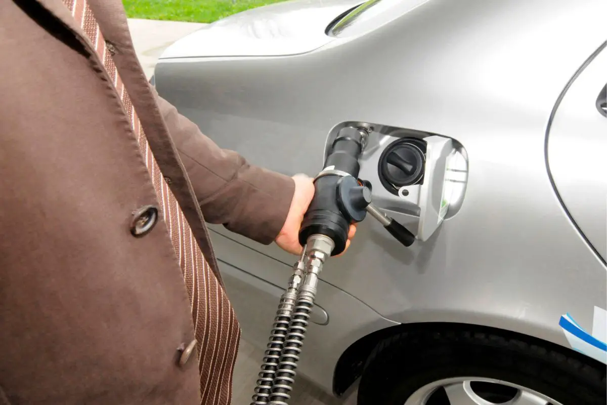 Hydrogen cars - Person refueling H2 vehicle