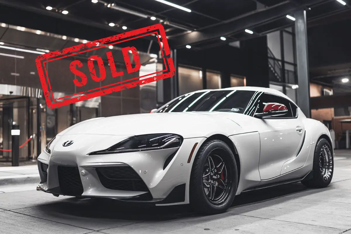 Toyota Mirai car sales vs. Supra sales - Image of a Supra Vehicle with Sold sign