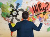 hydrogen economy - Person looking at world map - why