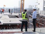 Hydrogen generator - general image of a construction site with Spain flag in the distance